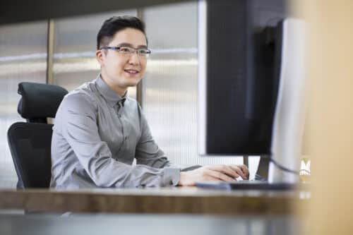 it technician conducting it security assessment on computer