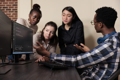 employee going through security assessment with other employees